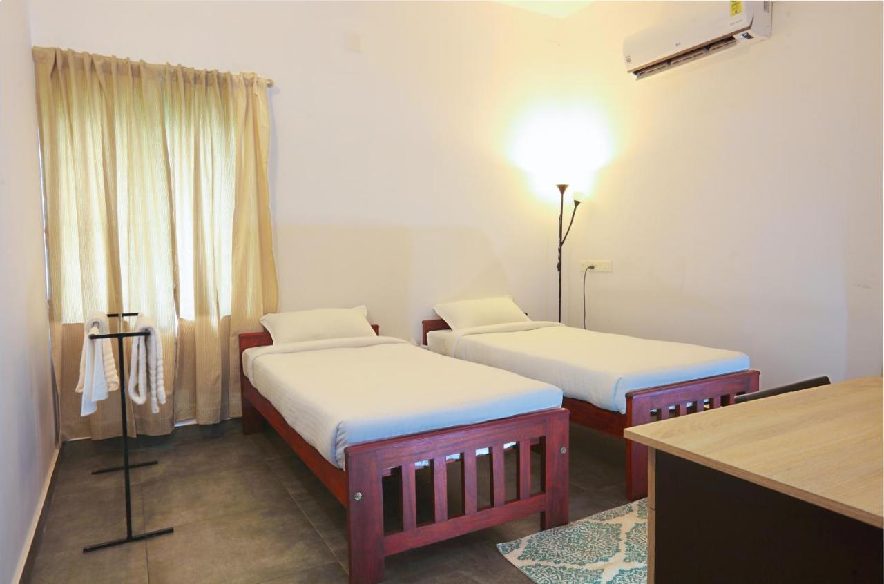 Monsoon Apartments Канур Екстериор снимка